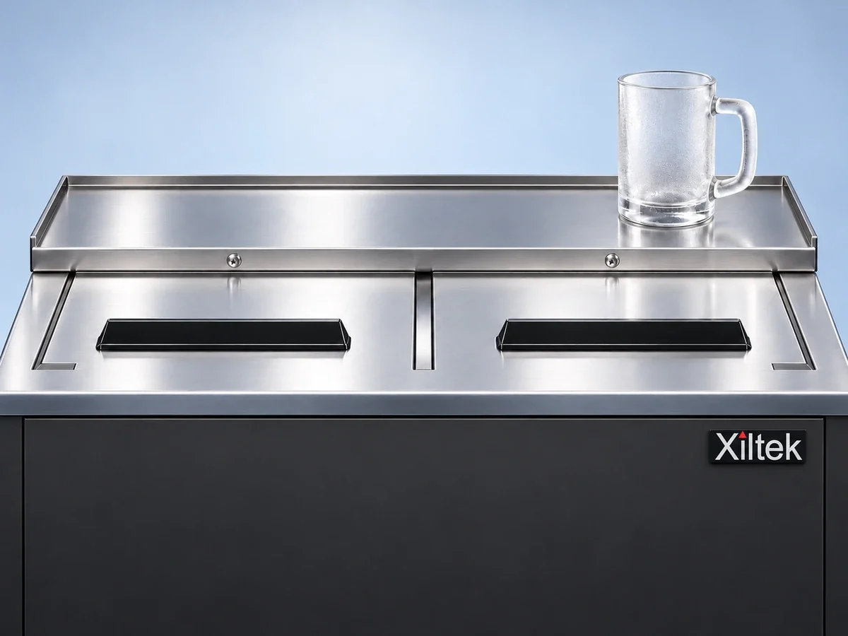 Stainless sliding lids and a frosted mug on a Xiltek glass froster
